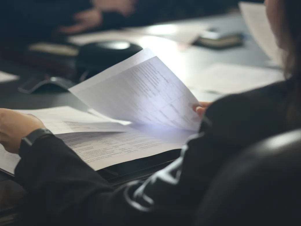 Professional reviewing trust-administration documents