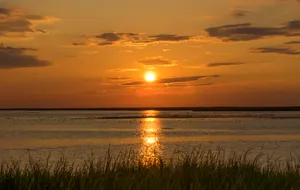 Sunrise over salt marsh at Bombay Hook in Delaware